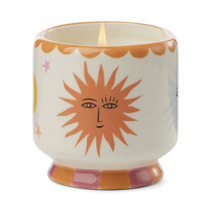 A Dopo 8 oz Handpainted Sun Ceramic Candle - Orange Blossom