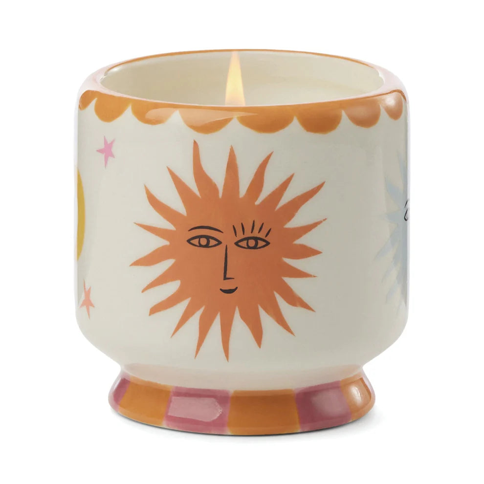 A Dopo 8 oz Handpainted Sun Ceramic Candle - Orange Blossom