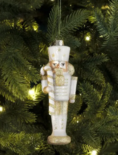 Load image into Gallery viewer, Glass Nutcracker Ornament White With Candy Cane