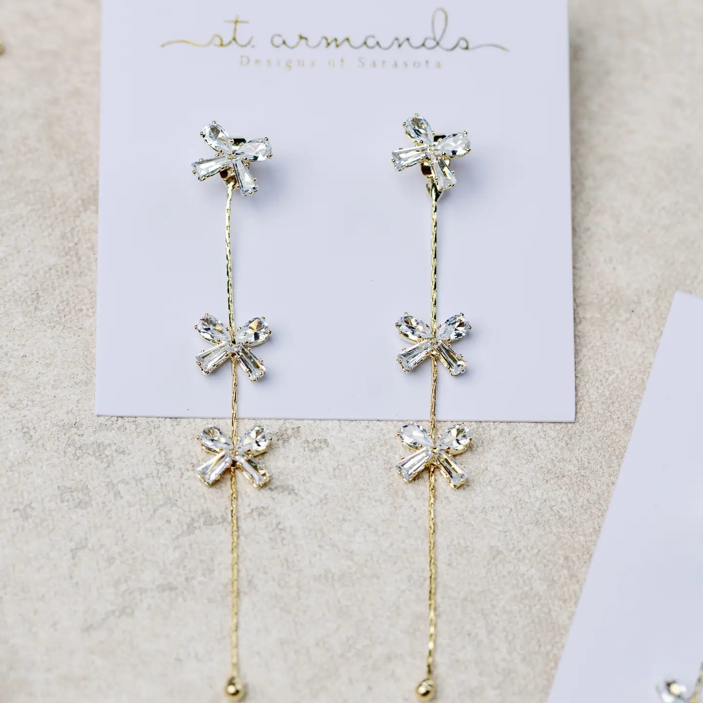 Diamond Bow Gold Duster Drop Earrings