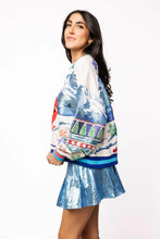 Load image into Gallery viewer, Queen of Sparkles White &amp; Blue Vintage Skiing Santa Sweatshirt